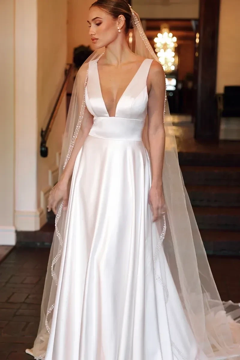Model wearing a white dress