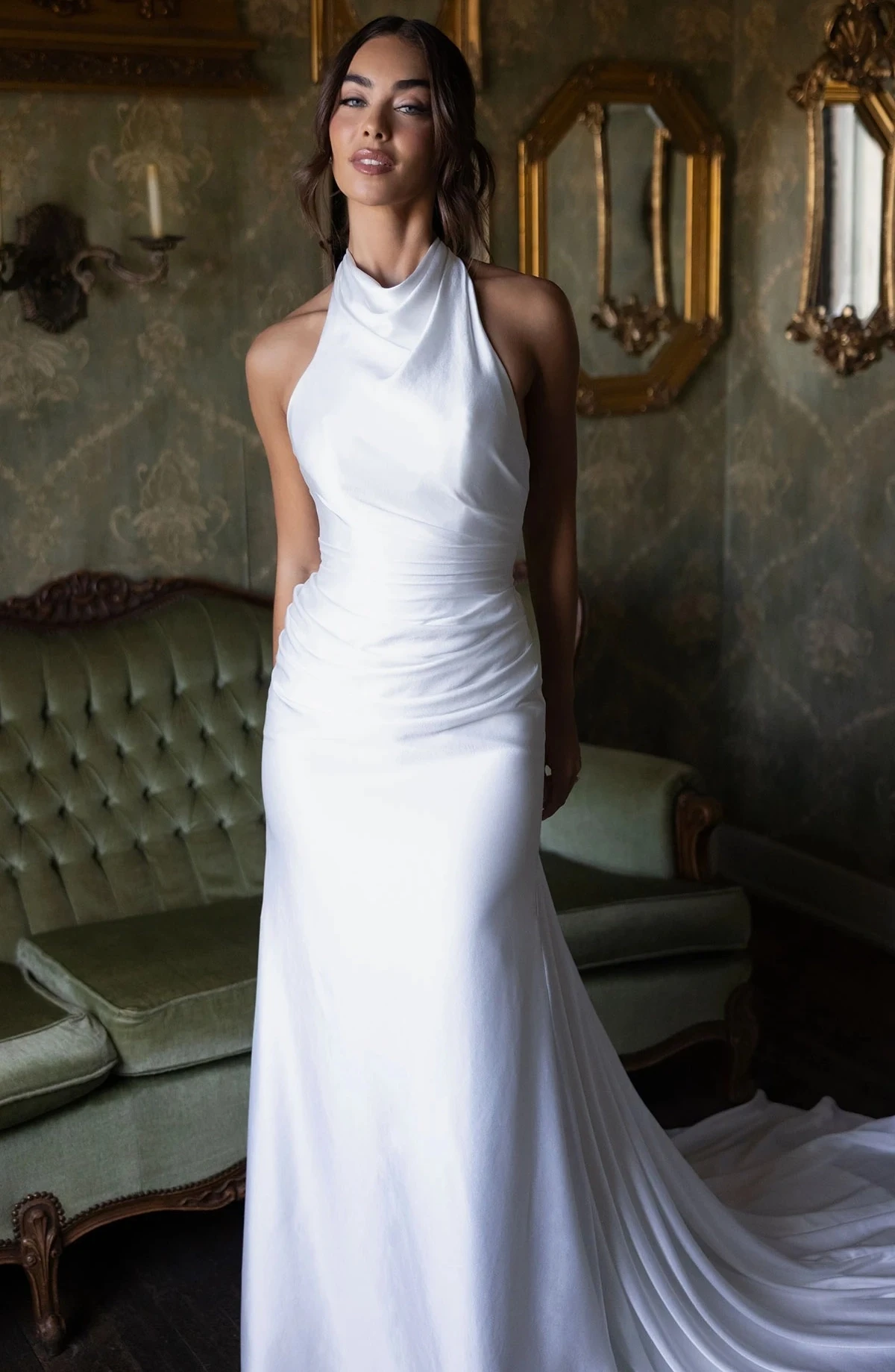 Model wearing a white dress